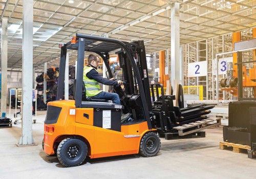 Man driving forklift
